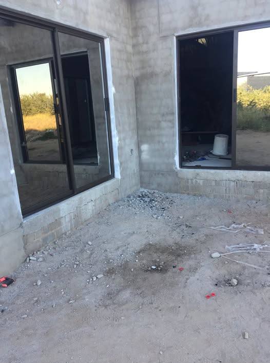 Aluminium window installed in a freshly plastered wall